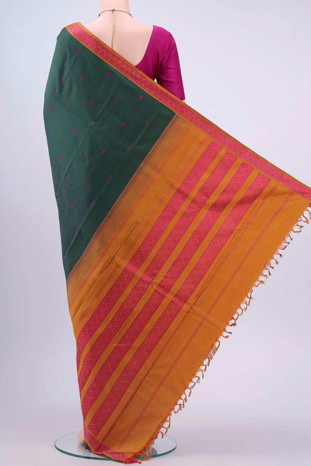 Flat view of Bottle Green Kanchipuram Silk Saree with Thread Butta on the body and Thread Border