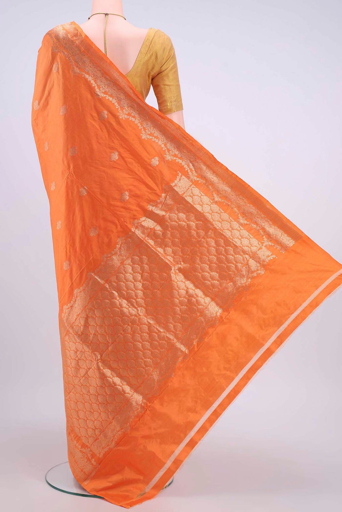 Flat view of Orange Dual Tone Banarasi Katan Silk Saree with Zari Butta on the body and Zari Border
