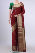 Maroon Kanchipuram Saree with Zari Butta on the body and Zari Border displayed on a mannequin