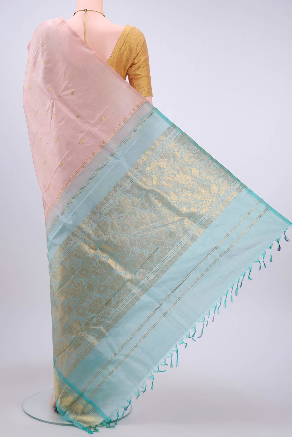 Flat view of Rose pink Kanchipuram Silk Saree with Zari Butta on the body and One Side Border