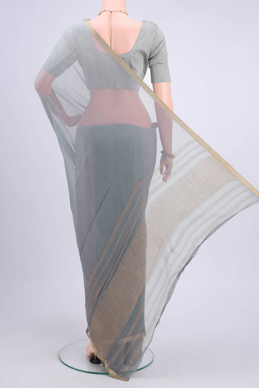 Flat view of Grey Mysore Chiffon Saree with Ombre design on the body and Zari Border