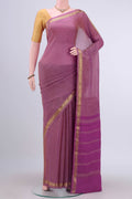 Pink Mysore Chiffon Saree with Plain Body and Zari Border displayed on a mannequin