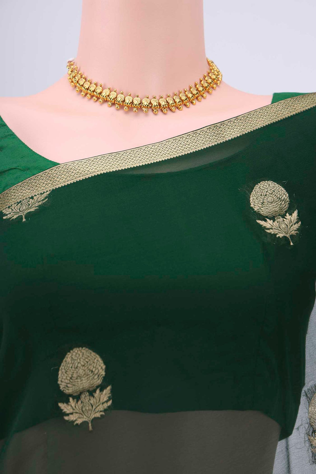 Border image of Bottle Green Mysore Georgette Saree with Zari Butta on the body and Zari Border