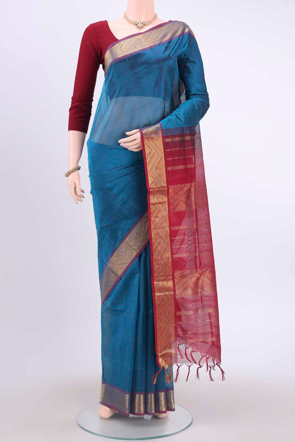 Blue Silk Cotton Saree with Plain Body and Zari Border displayed on a mannequin