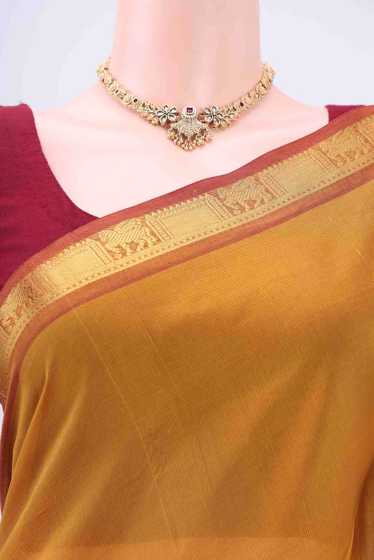 Border image of Mustard Blended Coimbatore Silk Cotton Saree with Plain Body and Zari Border