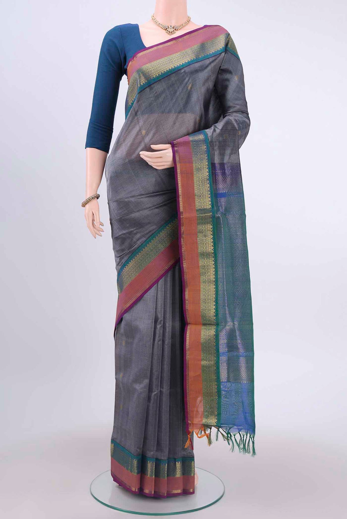 Blue Grey Silk Cotton Saree with Zari Butta on the body and Zari Border displayed on a mannequin