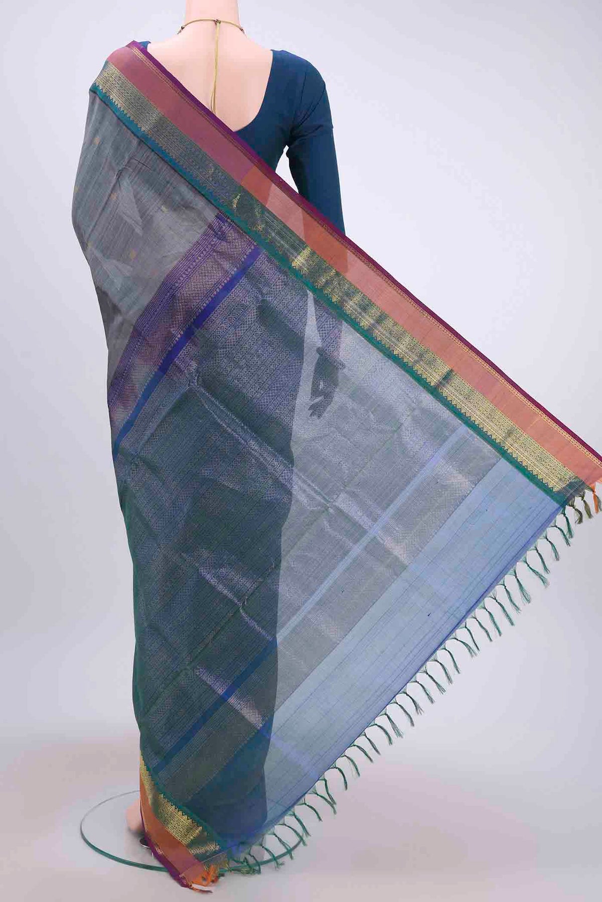 Flat view of Blue Grey Silk Cotton Saree with Zari Butta on the body and Zari Border