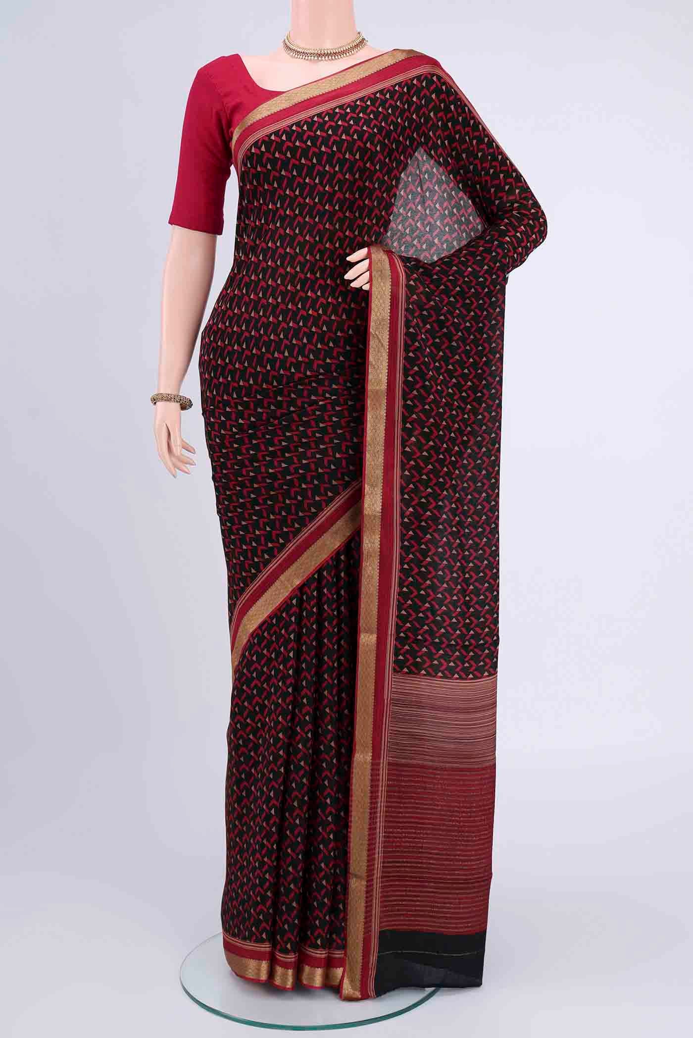 Black Mysore Crepe Saree with Floral Print on the body and Printed Border displayed on a mannequin