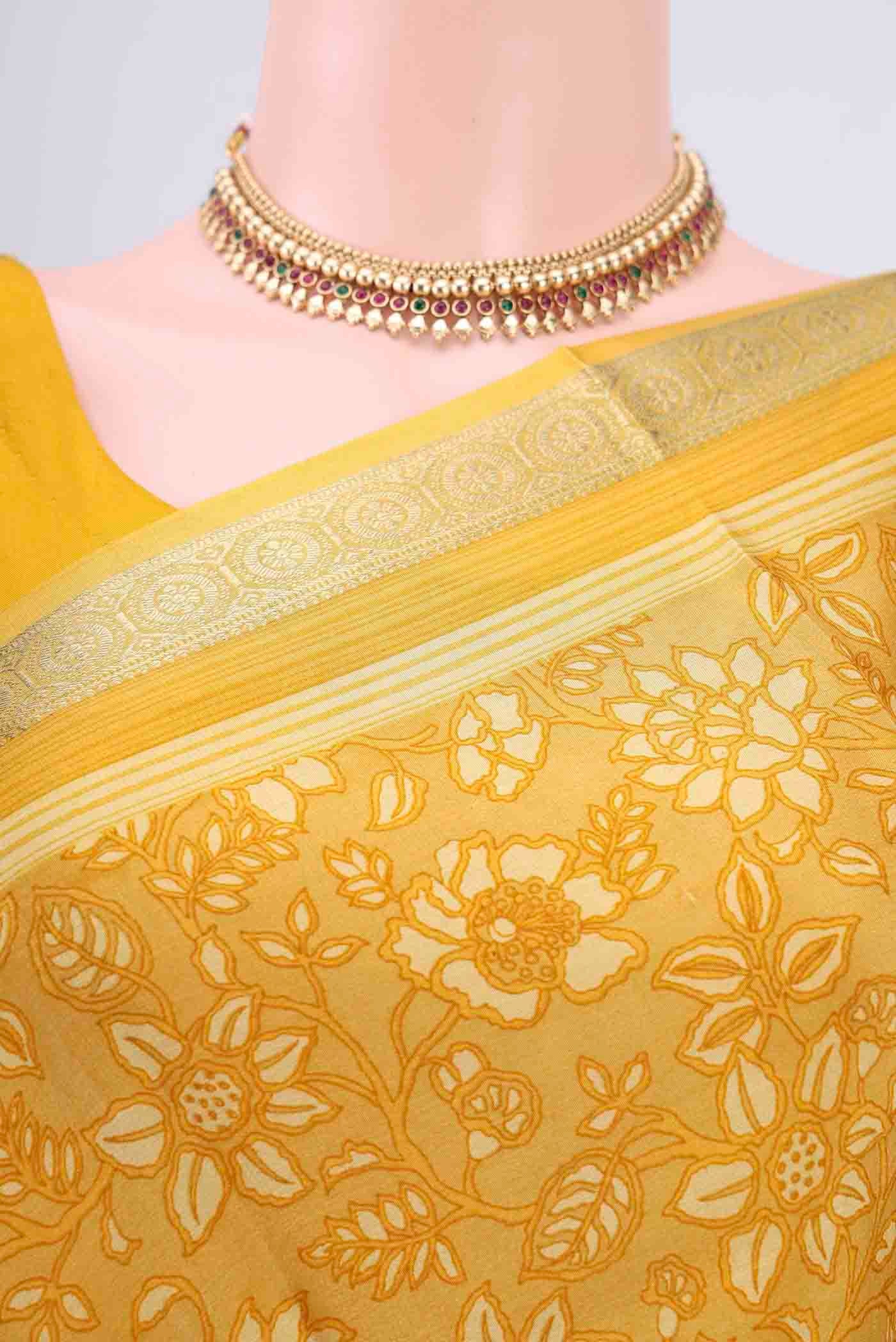 Border image of Yellow Mysore Crepe Saree with Floral Print on the body and Printed Border