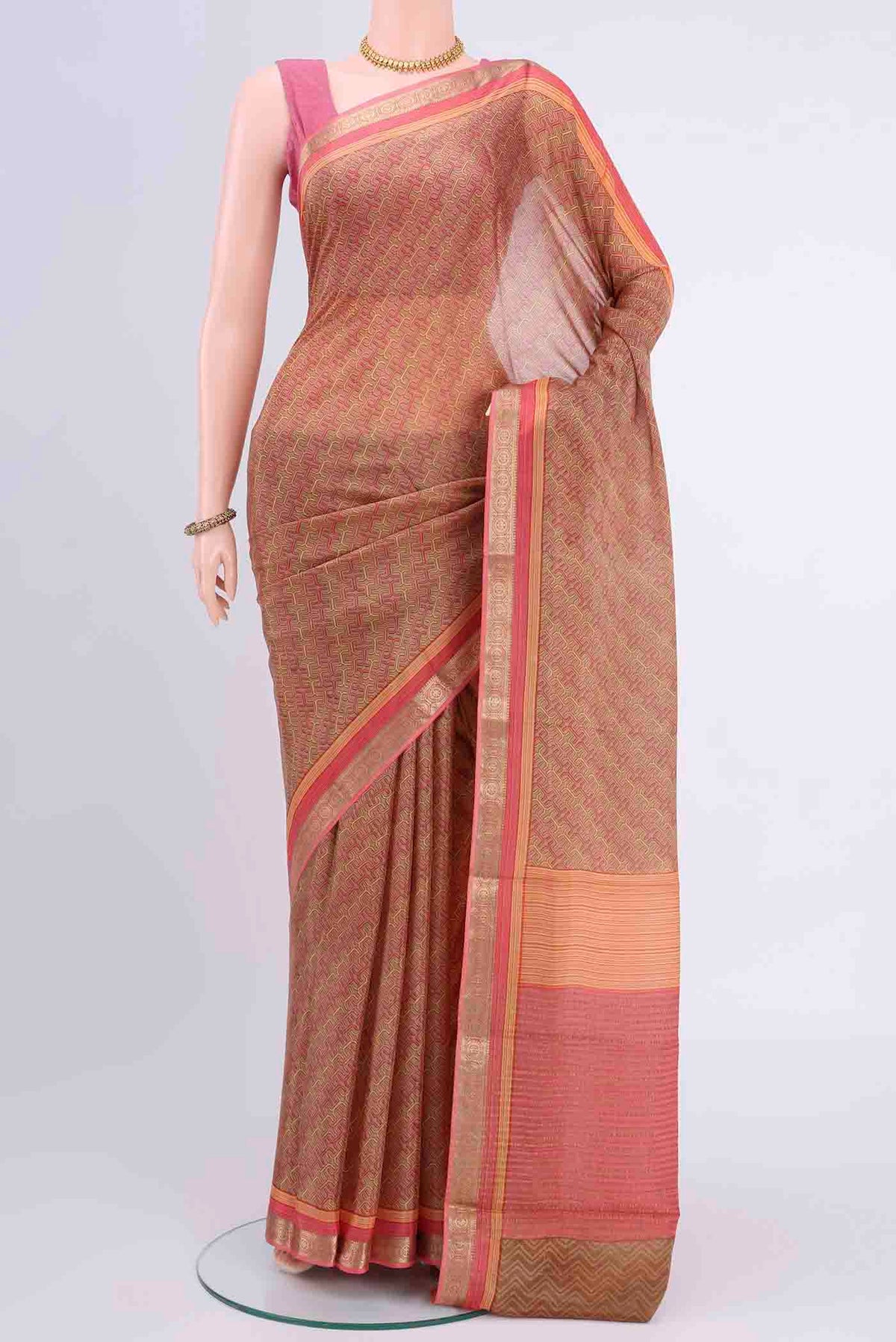 Beige Mysore Crepe Saree with Floral Print on the body and Printed Border displayed on a mannequin