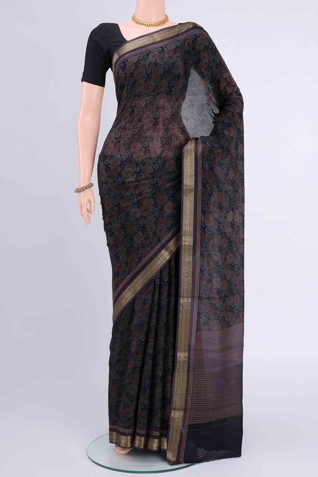 Black Mysore Crepe Saree with Floral Print on the body and Printed Border displayed on a mannequin