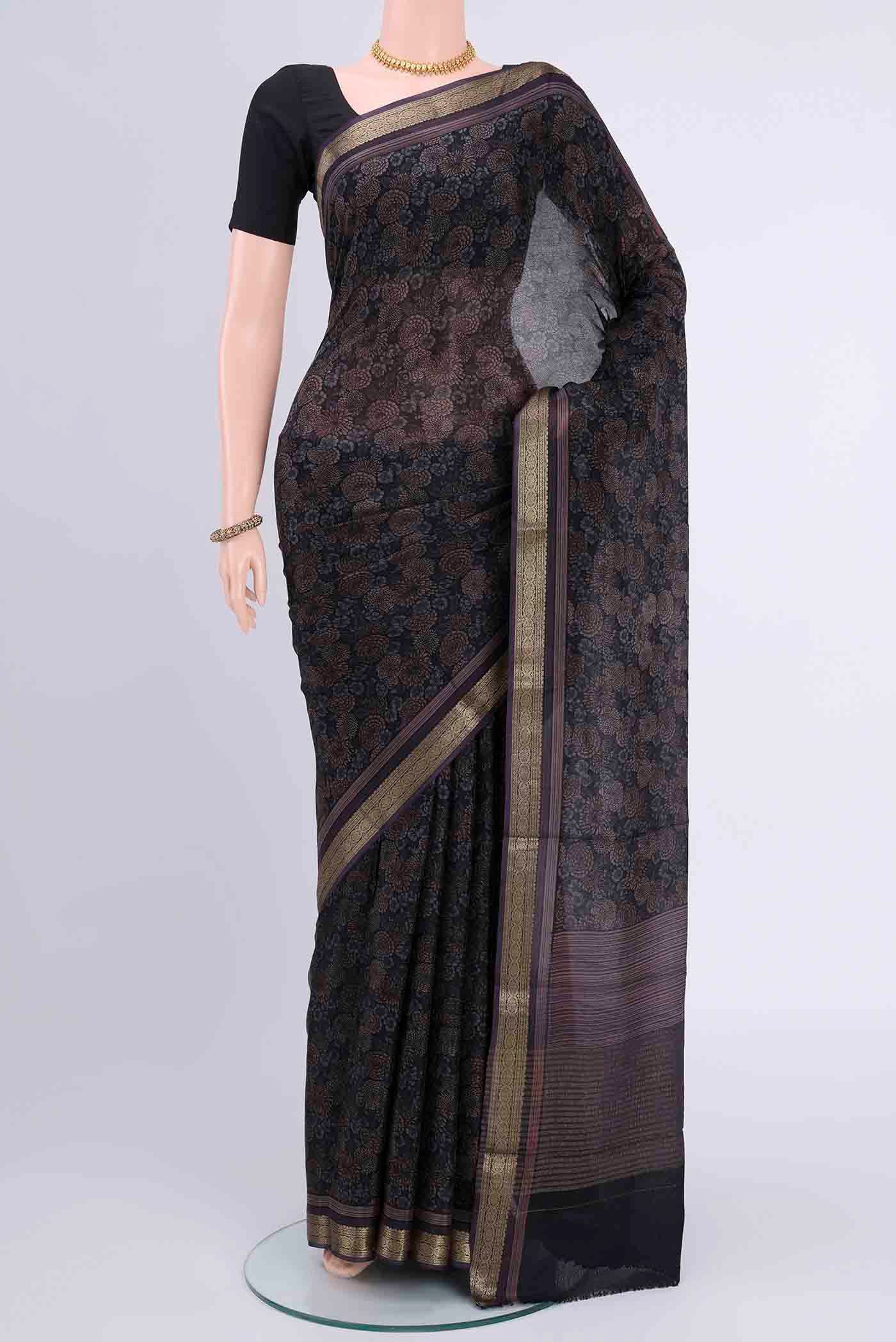 Black Mysore Crepe Saree with Floral Print on the body and Printed Border displayed on a mannequin