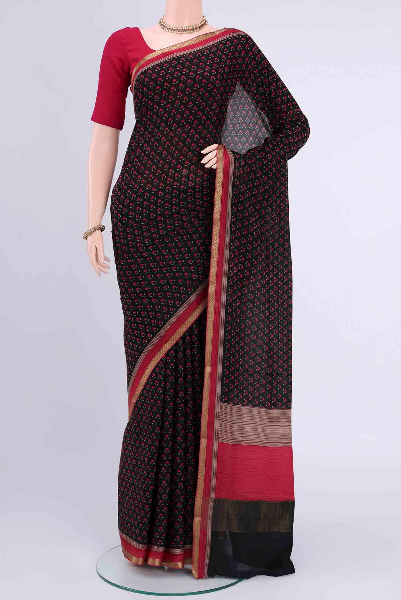 Black Mysore Crepe Saree with Floral Print on the body and Printed Border displayed on a mannequin