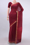 Magenta Mysore Crepe Saree with Floral Print on the body and Zari Border displayed on a mannequin
