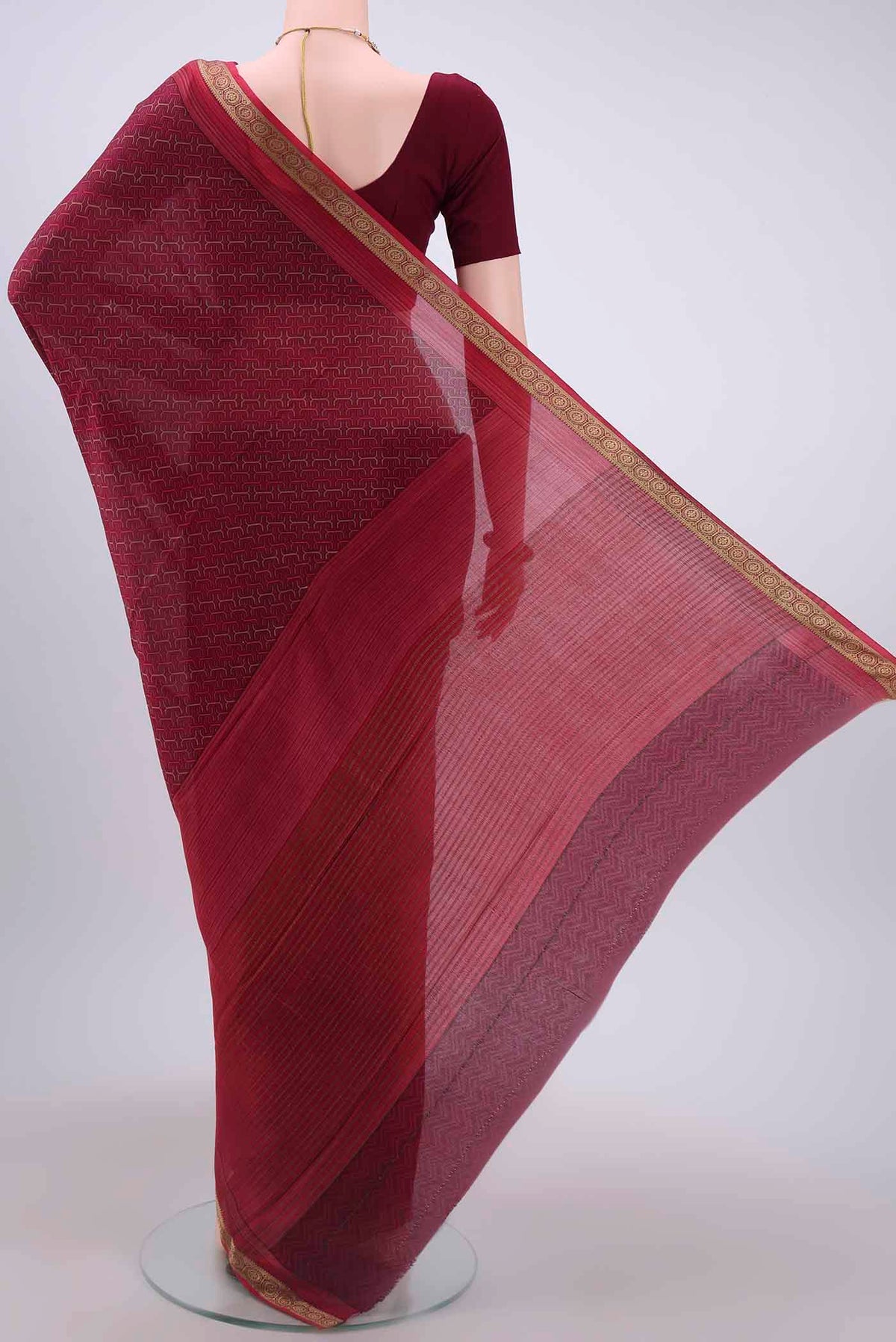 Flat view of Magenta Mysore Crepe Saree with Floral Print on the body and Zari Border