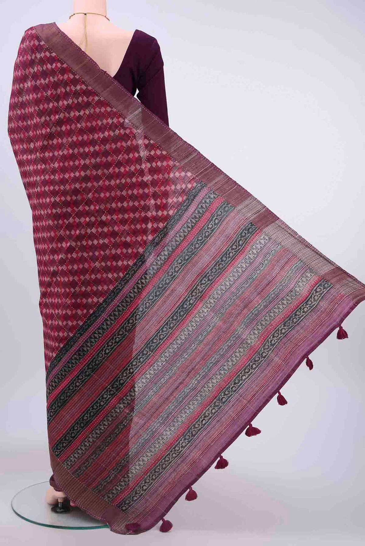 Flat view of Magenta Tussar Silk Saree with Checked design on the body and Zari Border