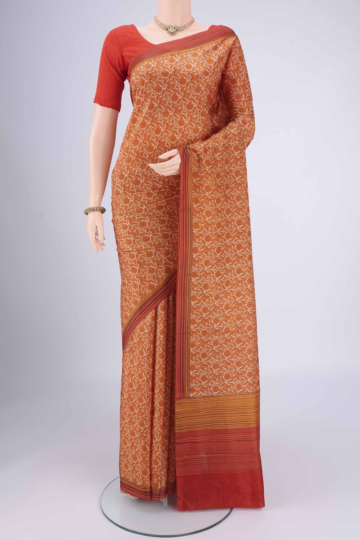 Beige Dual Tone Printed Silk Saree with Printed design on the body and Zari Border.  displayed on a mannequin