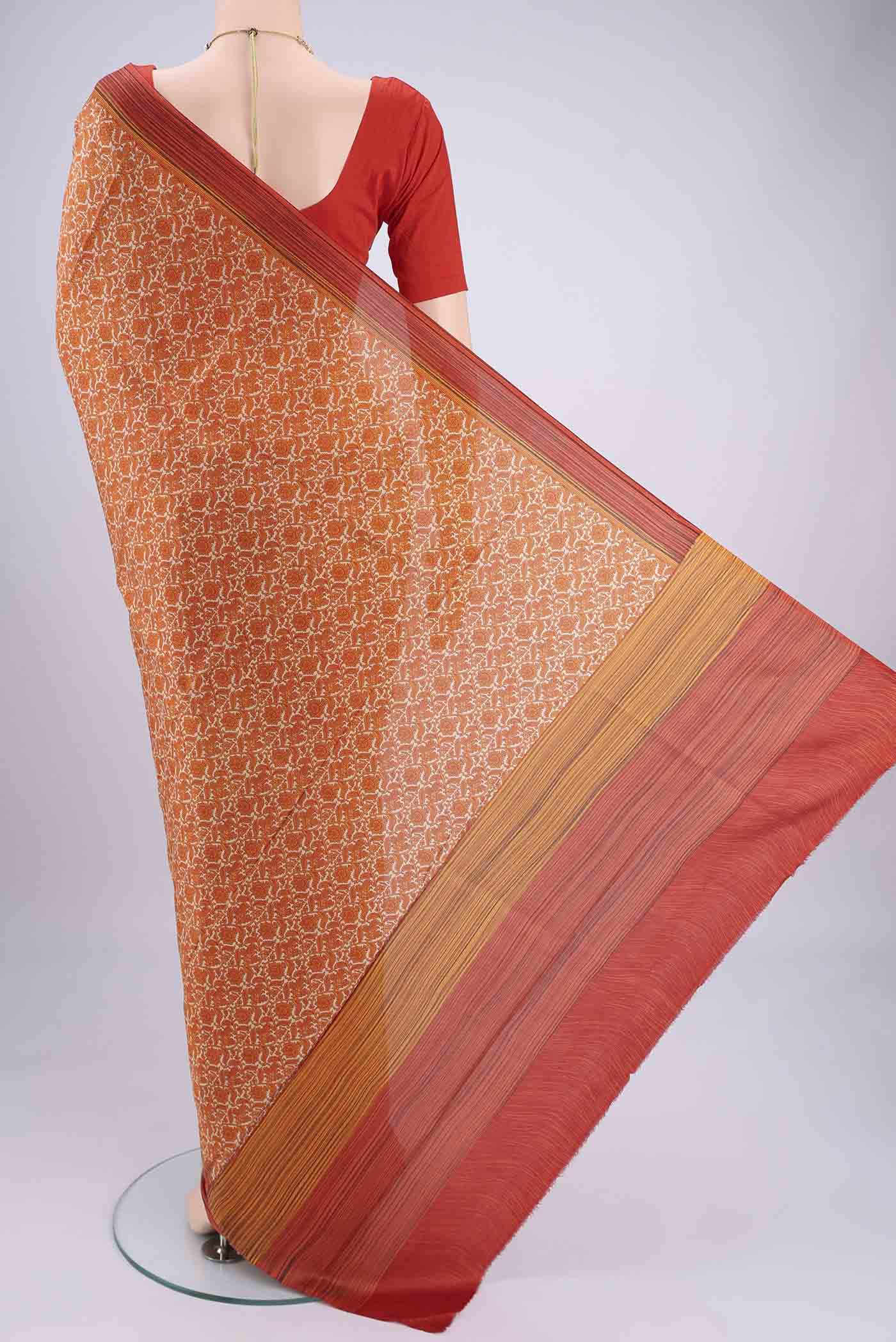 Flat view of Beige Dual Tone Printed Silk Saree with Printed design on the body and Zari Border. 