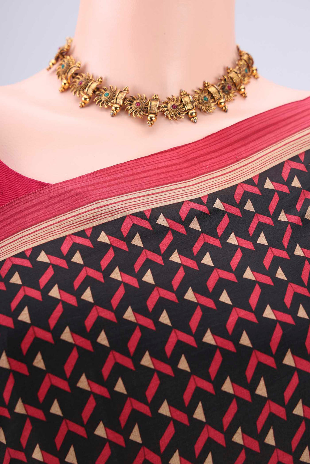 Border image of Black Printed Silk Saree with Floral Print on the body and Printed Border. 