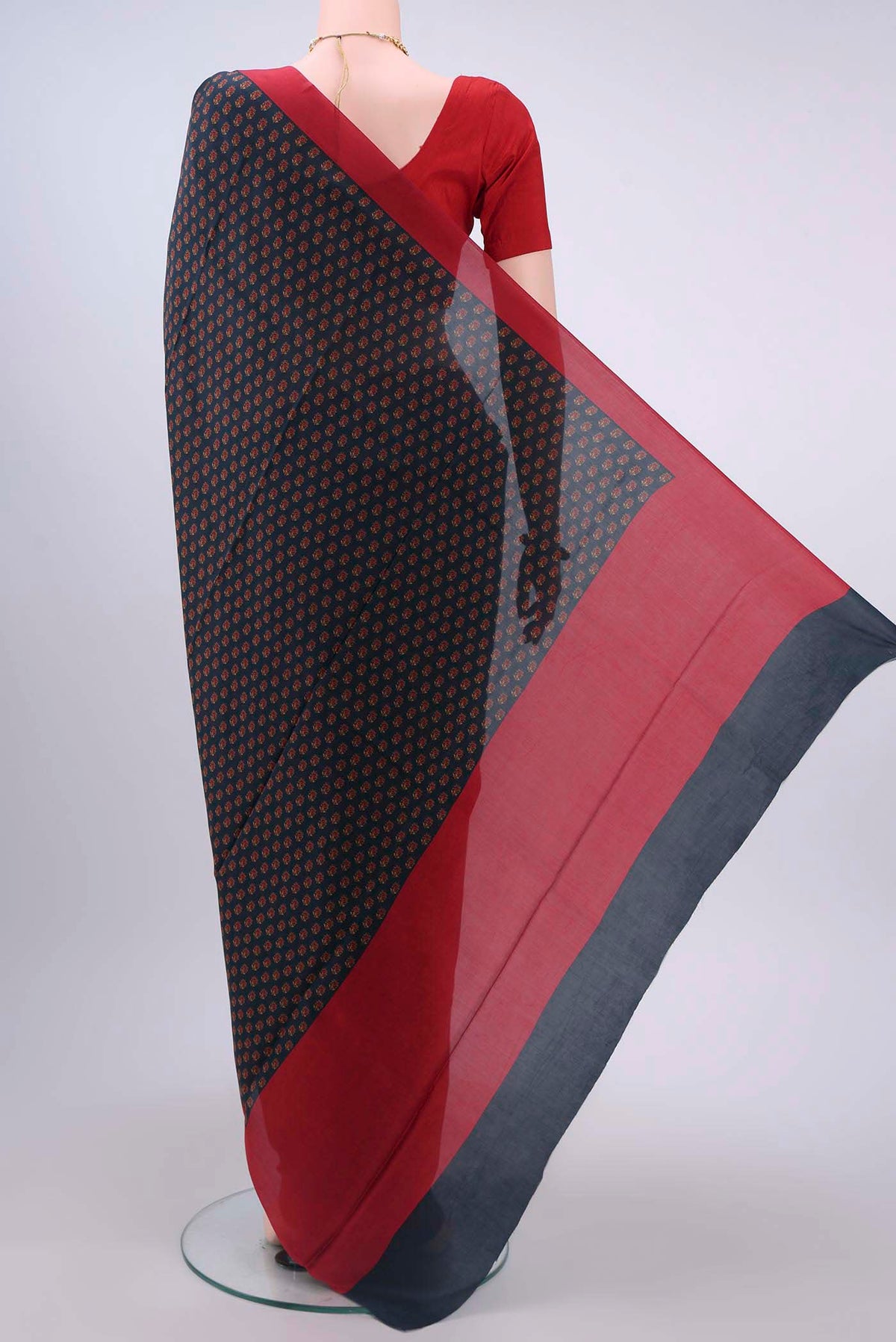 Flat view of Navy Blue Printed Silk Saree with Printed design on the body and Lace Border