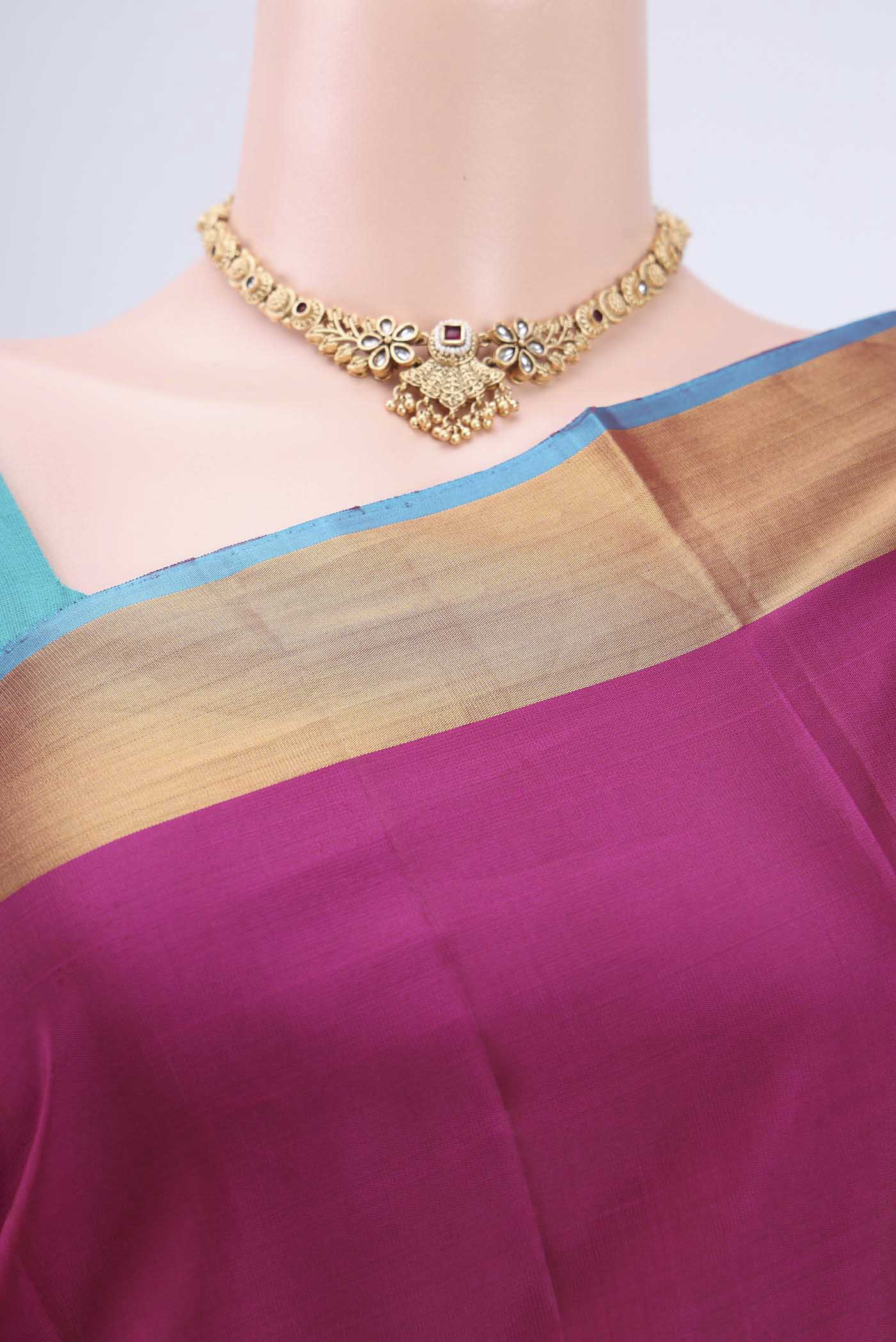 Border image of Magenta Soft Silk Saree with Zari Butta on the body and Zari Border. 