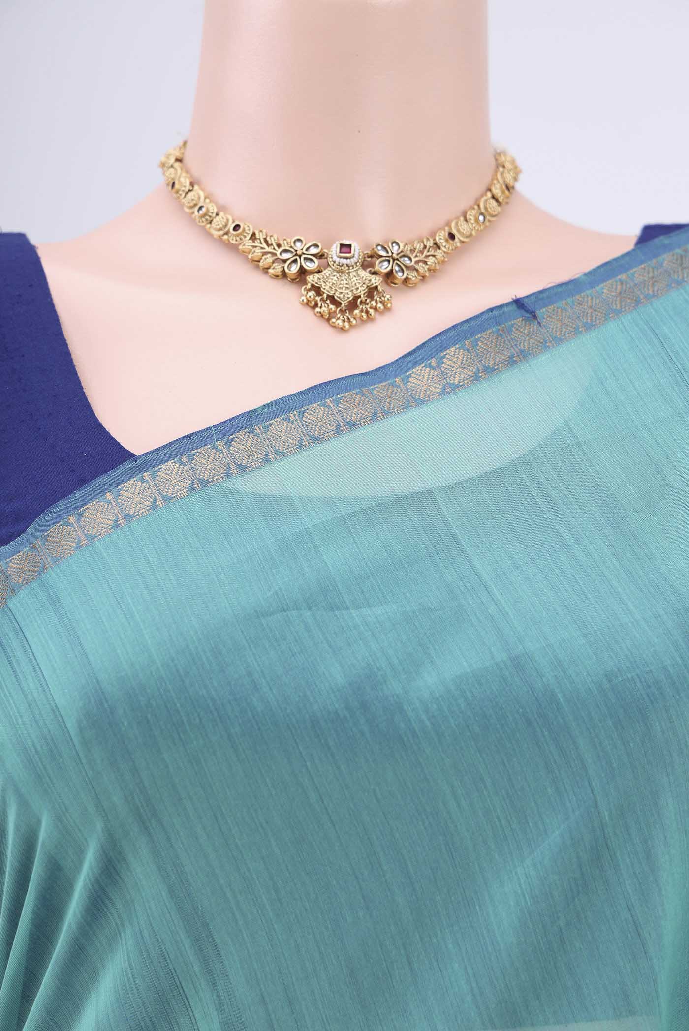 Border image of Dark Blue Maheshwari Silk Cotton Saree with Stripes on the body and Zari Border. 