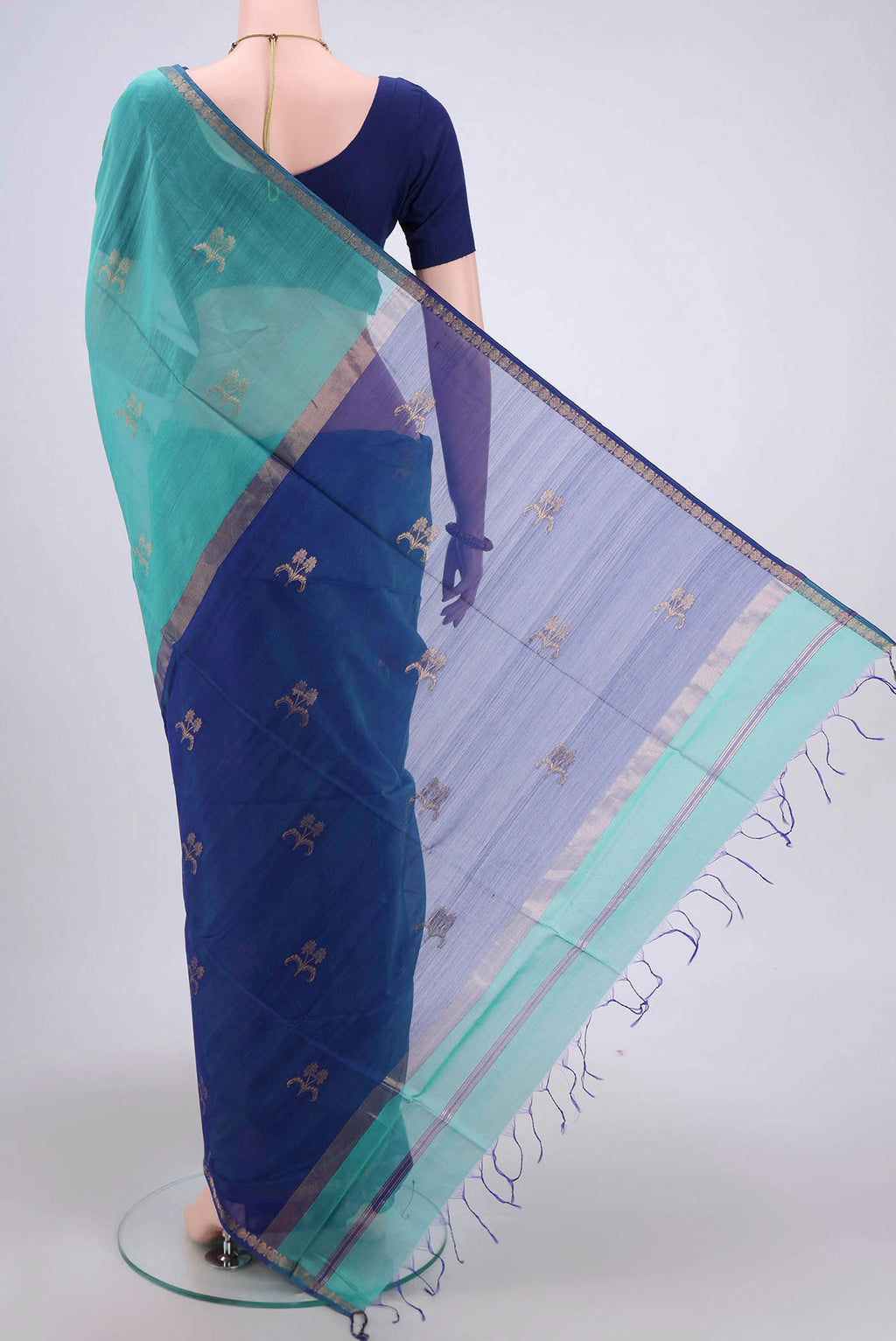 Flat view of Dark Blue Maheshwari Silk Cotton Saree with Stripes on the body and Zari Border. 