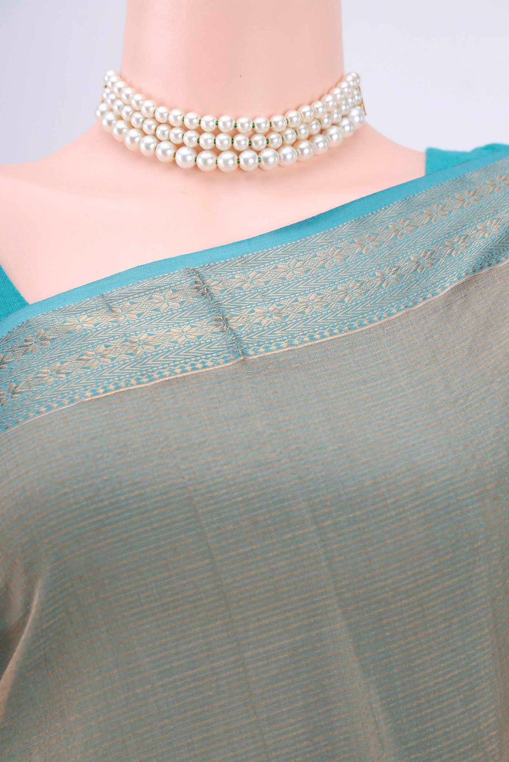 Border image of Dark Beige Maheshwari Silk Cotton Saree with Stripes on the body and Zari Border. 