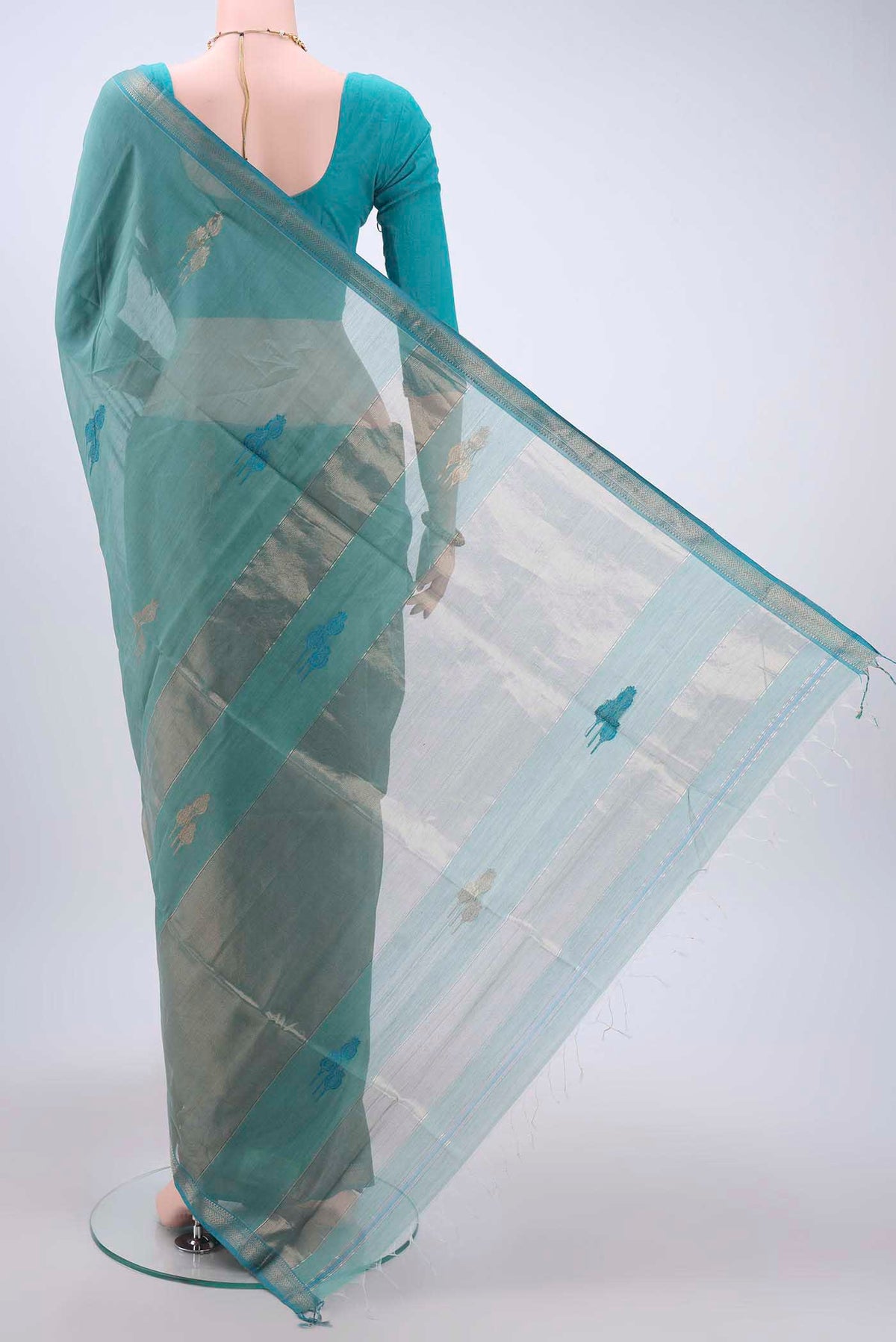 Flat view of Blue Maheshwari Silk Cotton Saree with Thread Butta on the body and Zari Border