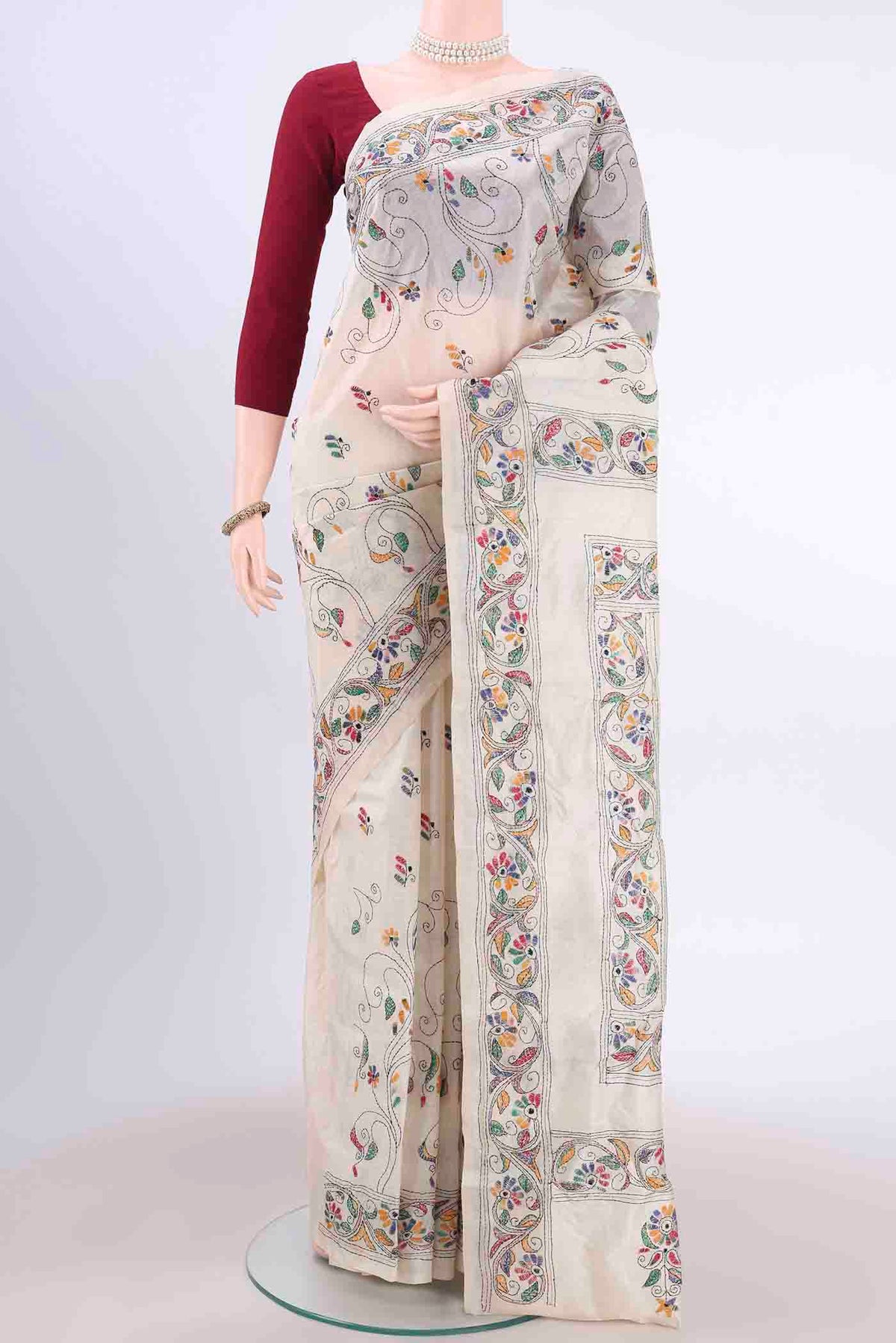 Beige Kantha Silk Saree with Kantha Work on the body and Thread Border displayed on a mannequin