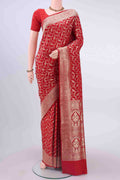 Red Banarasi Silk Saree with Zari Brocade on the body and Zari Border displayed on a mannequin