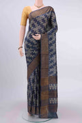Davys Grey Dual Tone Tussar Silk Saree with Printed design on the body and Zari Border displayed on a mannequin