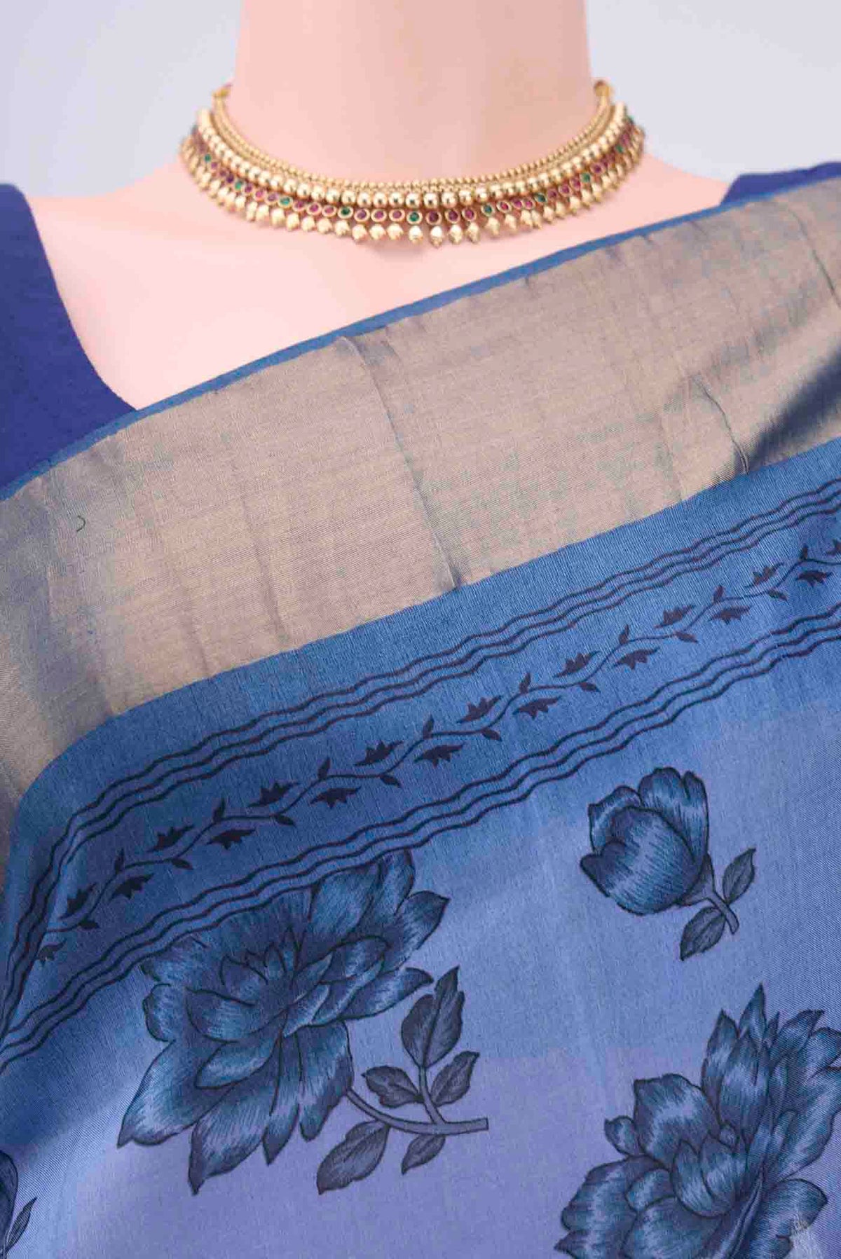 Border image of Blue Tussar Silk Saree with Printed design on the body and Zari Border