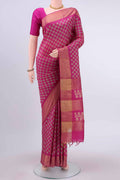Rani Pink Dual Tone Tussar Silk Saree with Printed design on the body and Zari Border displayed on a mannequin
