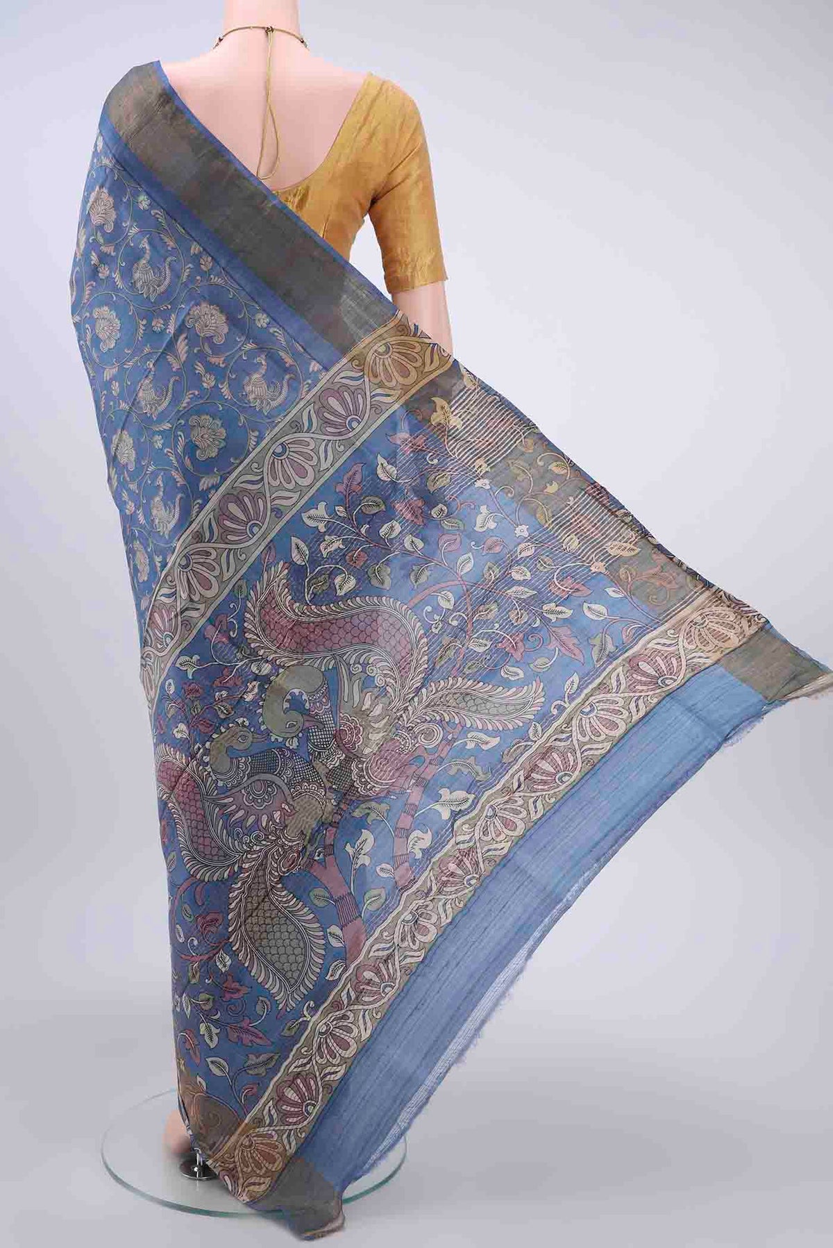 Flat view of Light Blue Dual Tone Tussar Silk Saree with Printed design on the body and Zari Border
