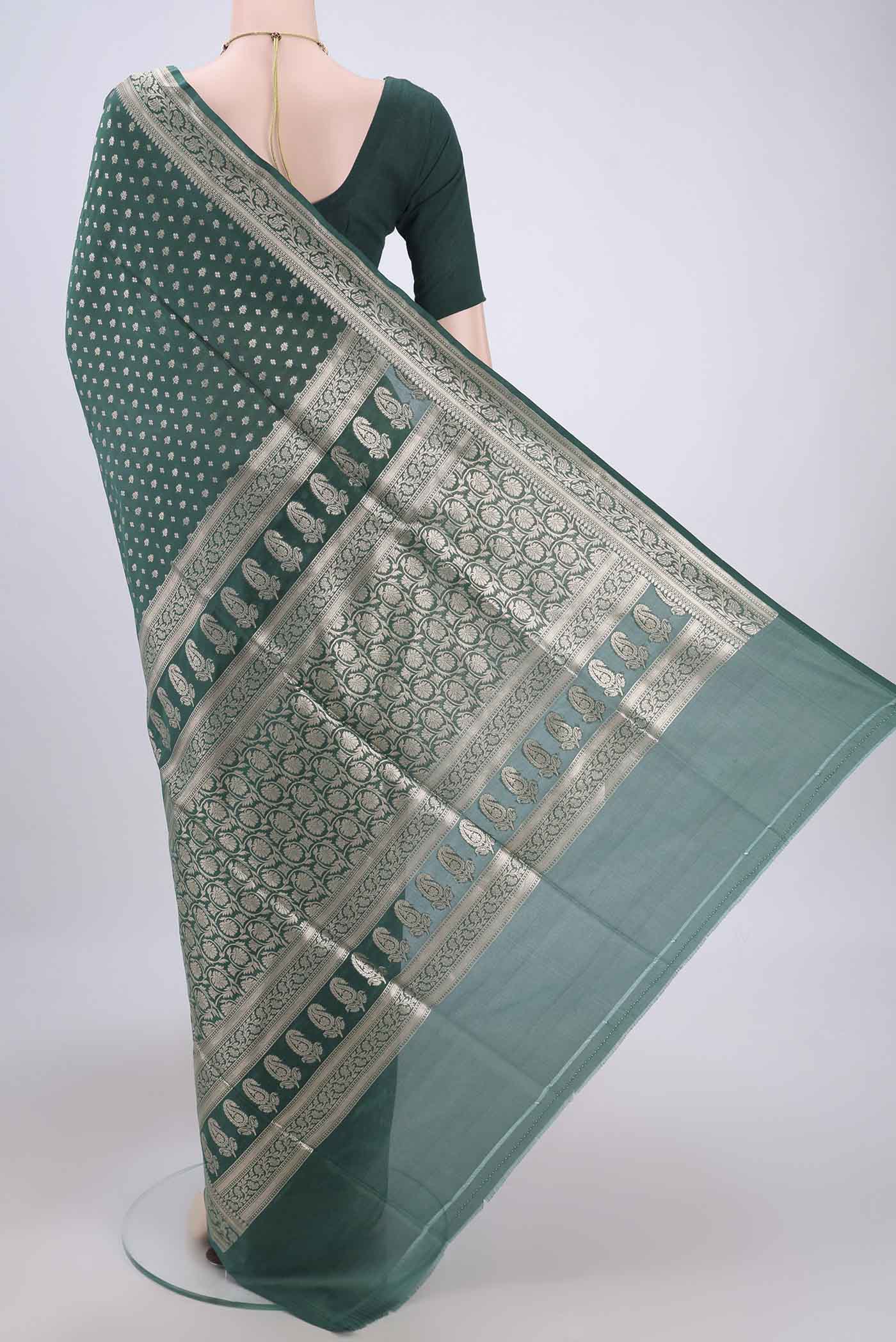 Flat view of Green Banarasi Jamavar Saree with Zari Brocade on the body and Zari Border. 