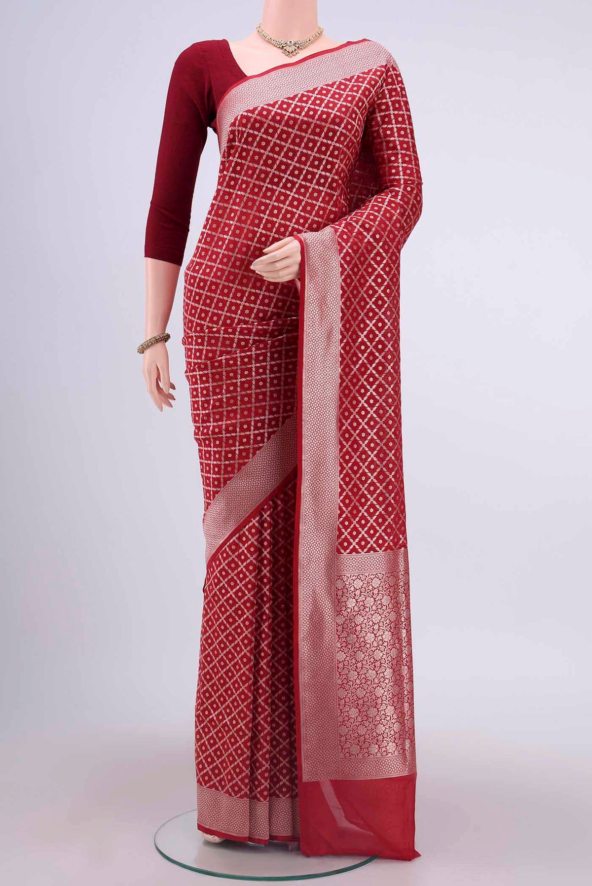 Red Dual Tone Banarasi Silk Saree with Zari Brocade on the body and Zari Border displayed on a mannequin