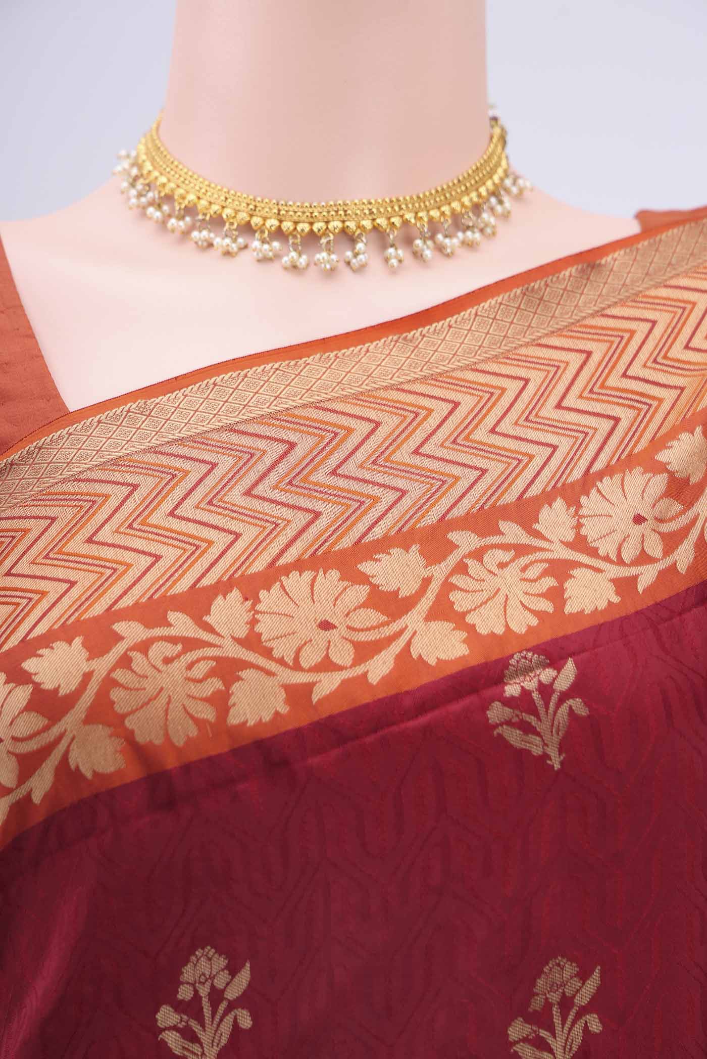 Border image of Maroon Soft Silk Saree with Jacquard design on the body and Zari Border
