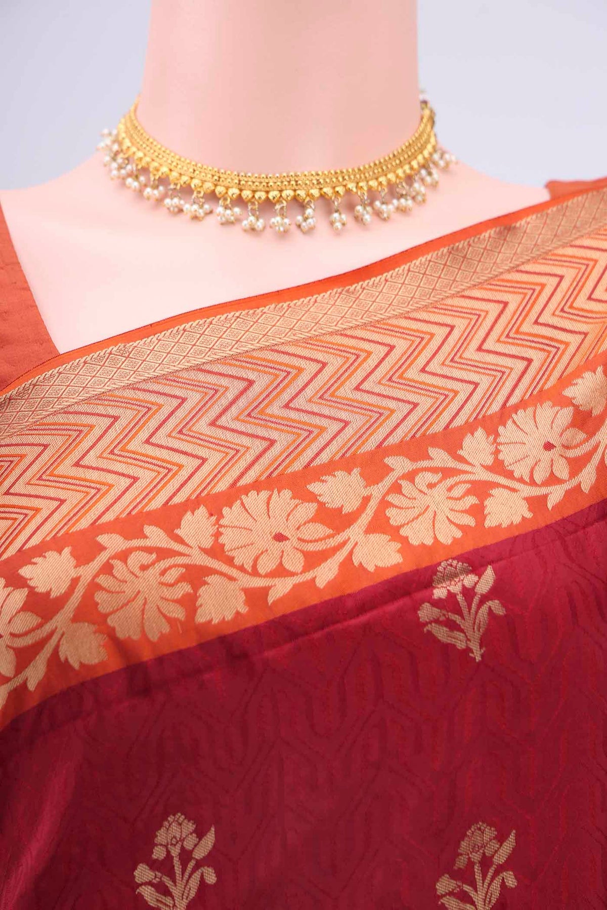 Border image of Maroon Soft Silk Saree with Jacquard design on the body and Zari Border