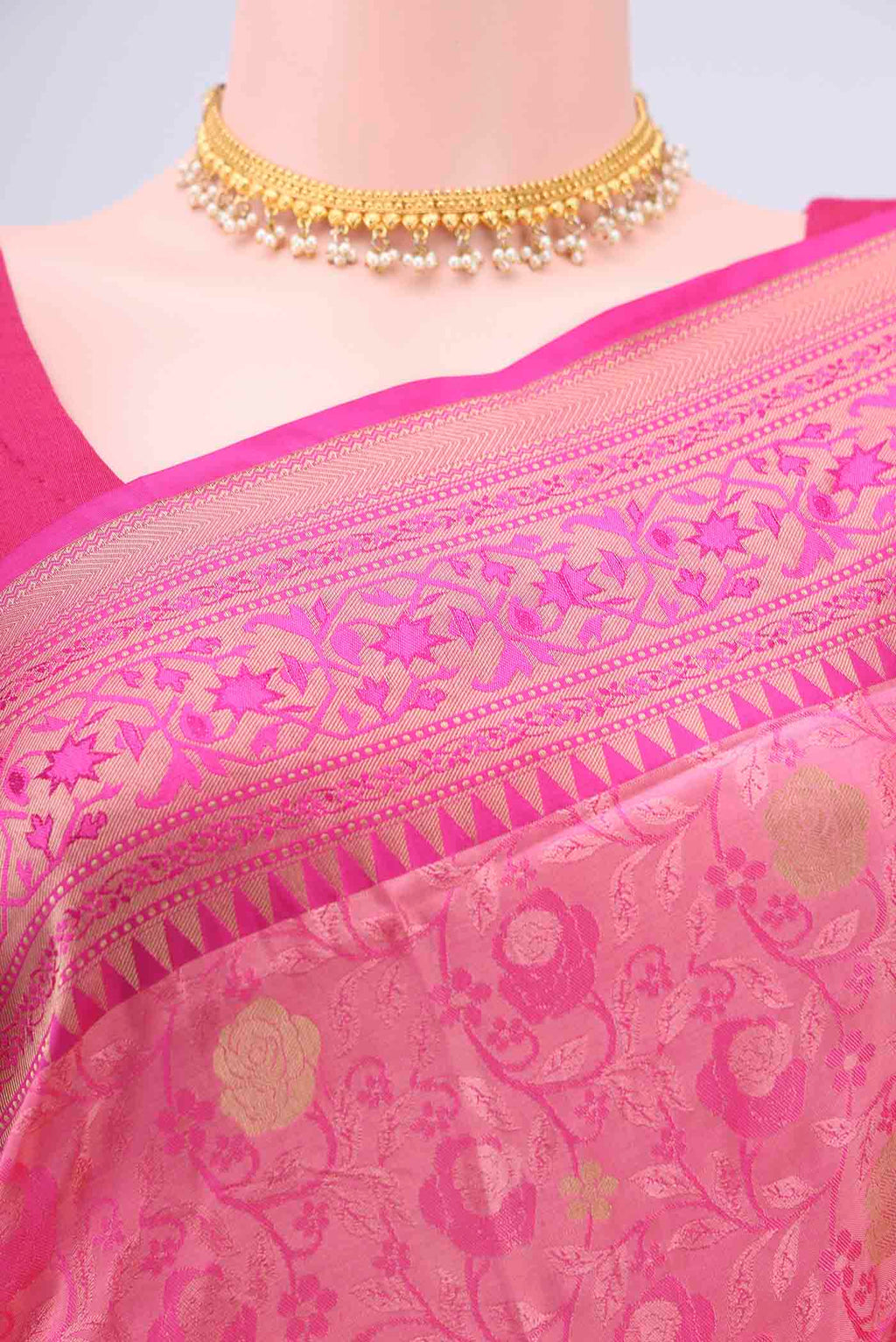 Border image of Rani Pink Soft Silk Saree with Jacquard design on the body and Zari Border