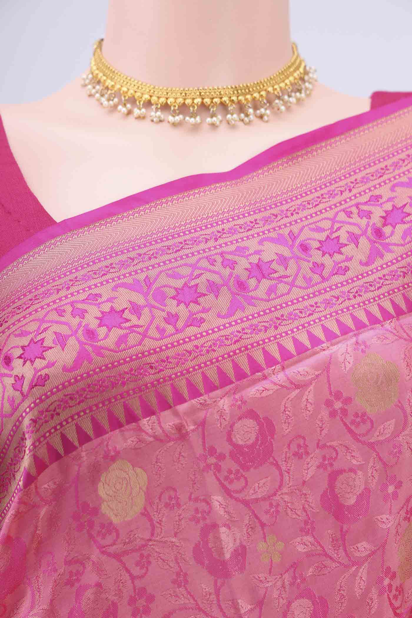 Border image of Rani Pink Soft Silk Saree with Jacquard design on the body and Zari Border