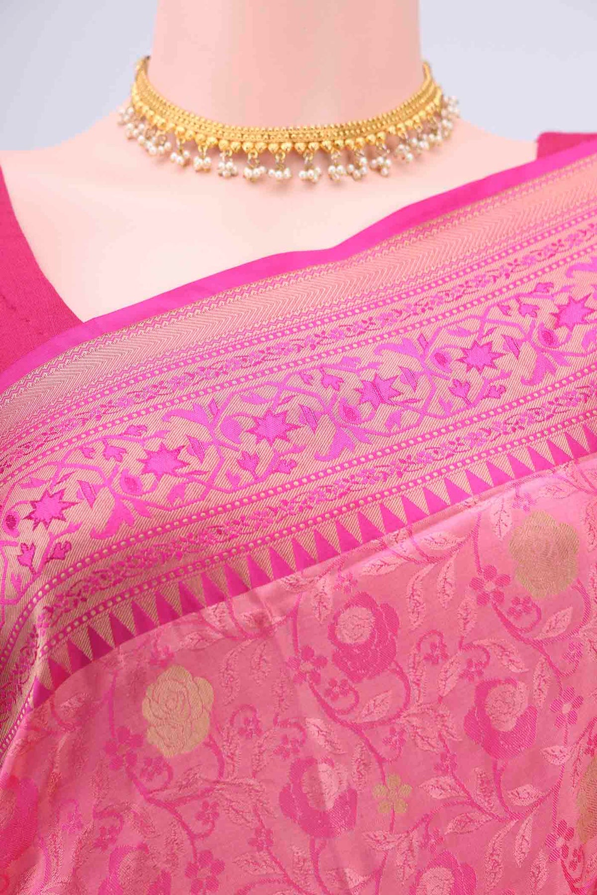 Border image of Rani Pink Soft Silk Saree with Jacquard design on the body and Zari Border