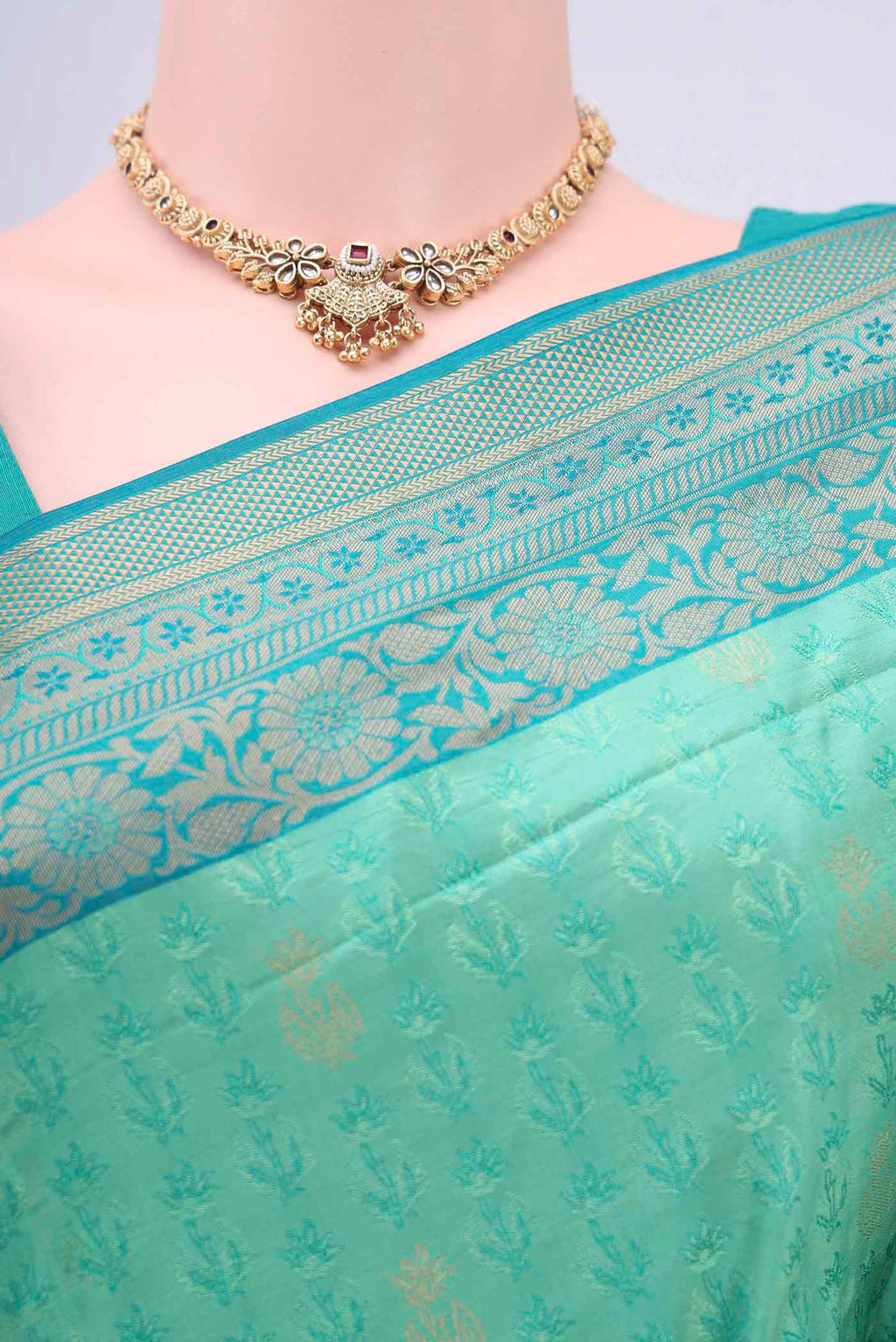 Border image of Turquoise Soft Silk Saree with Jacquard design on the body and Zari Border