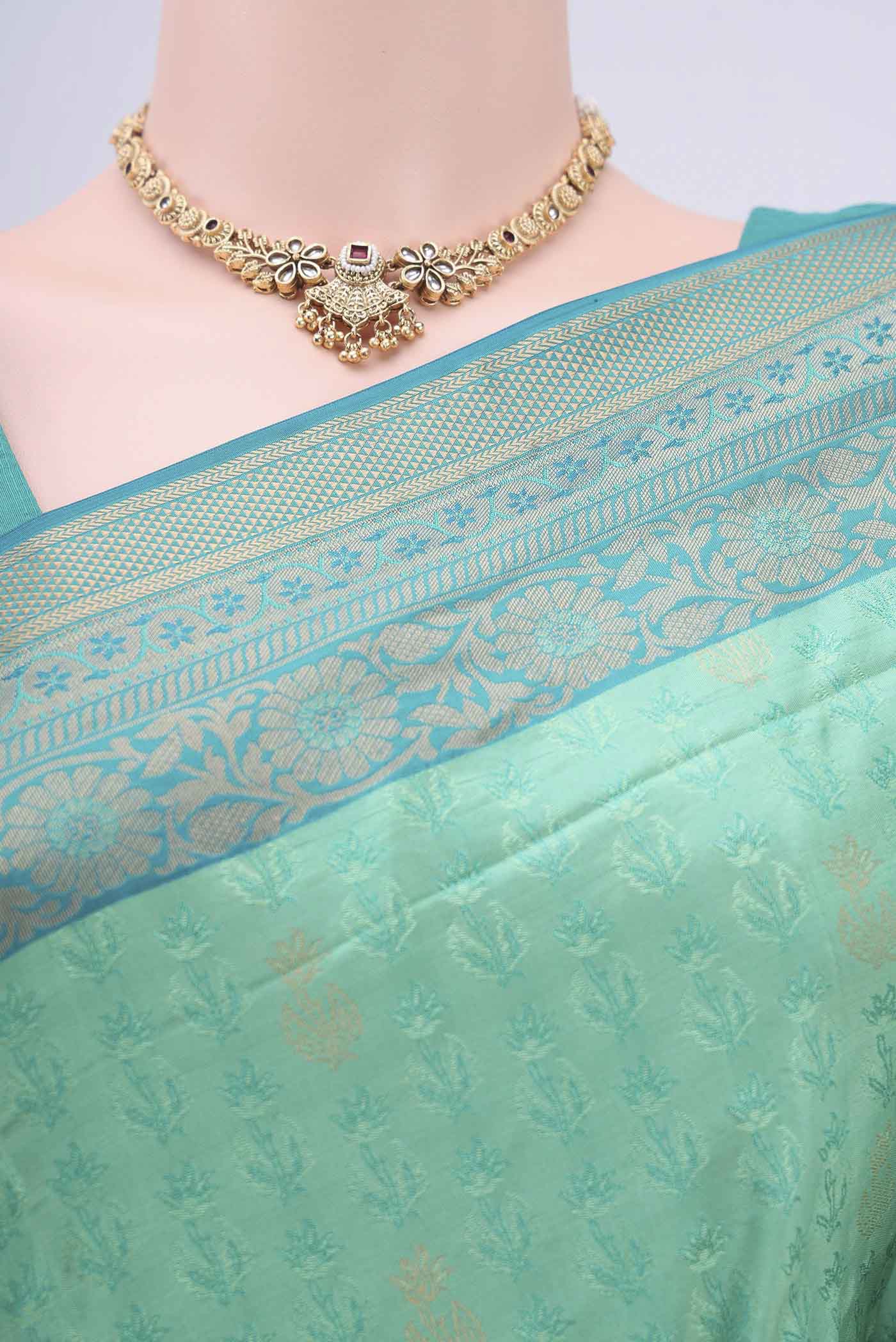 Border image of Turquoise Soft Silk Saree with Jacquard design on the body and Zari Border