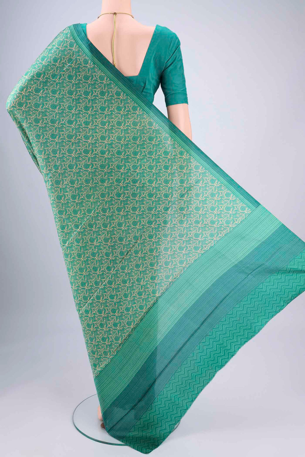 Flat view of Beige Printed Silk Saree with Floral Print on the body and Printed Border. 