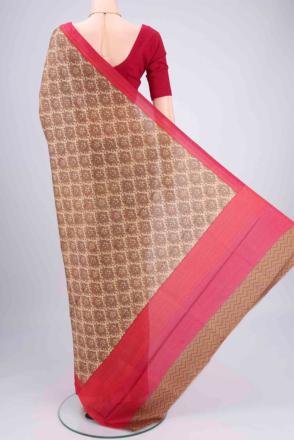 Flat view of Beige Printed Silk Saree with Floral Print on the body and Printed Border. 