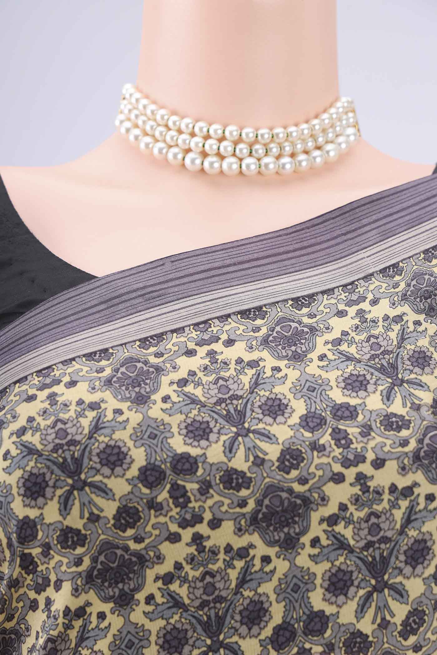Border image of Cream Dual Tone Printed Silk Saree with Printed design on the body and Zari Border. 