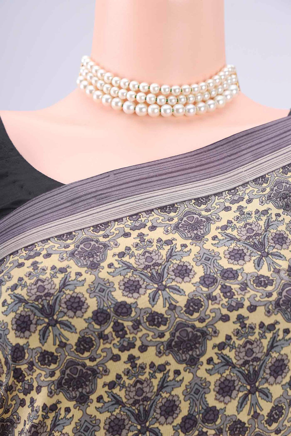 Border image of Cream Dual Tone Printed Silk Saree with Printed design on the body and Zari Border. 