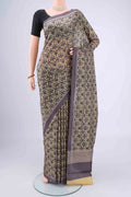 Cream Dual Tone Printed Silk Saree with Printed design on the body and Zari Border.  displayed on a mannequin