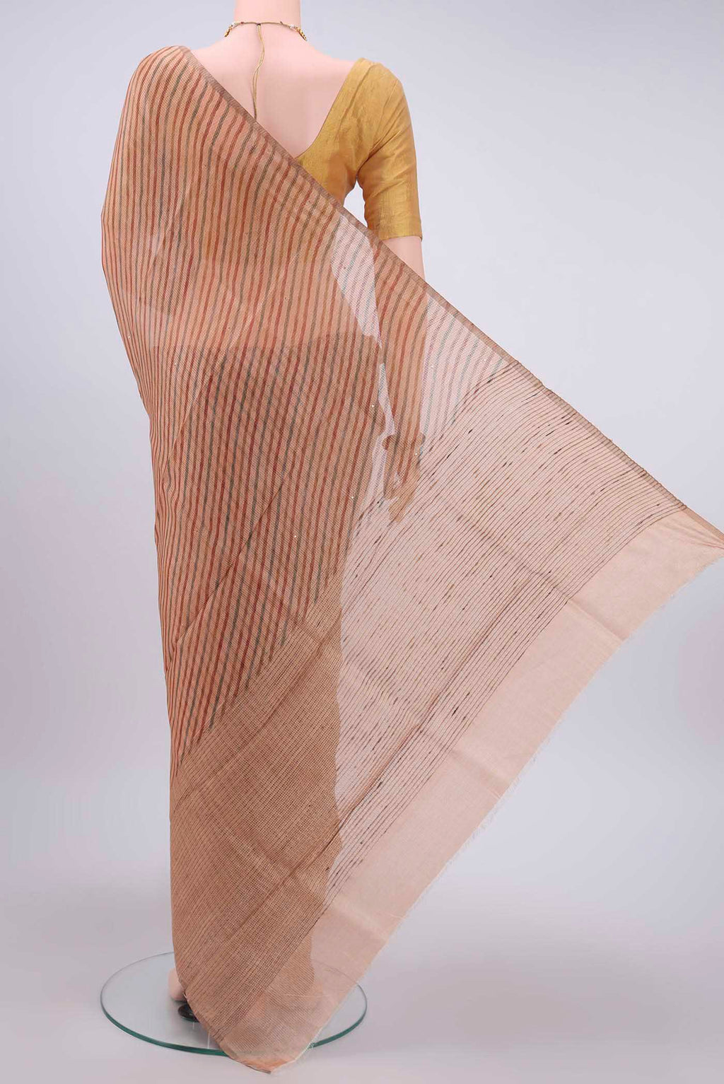 Flat view of Peach Tussar Silk Saree with Printed design on the body and Printed Border
